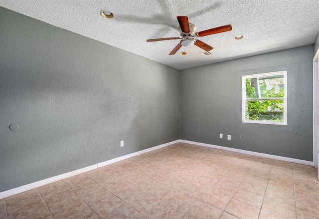 1824 David Ter, Oklahoma City, OK 73141 - empty room featuring a textured ceiling, visible vents, tile patterned floors, a ceiling fan, and baseboards