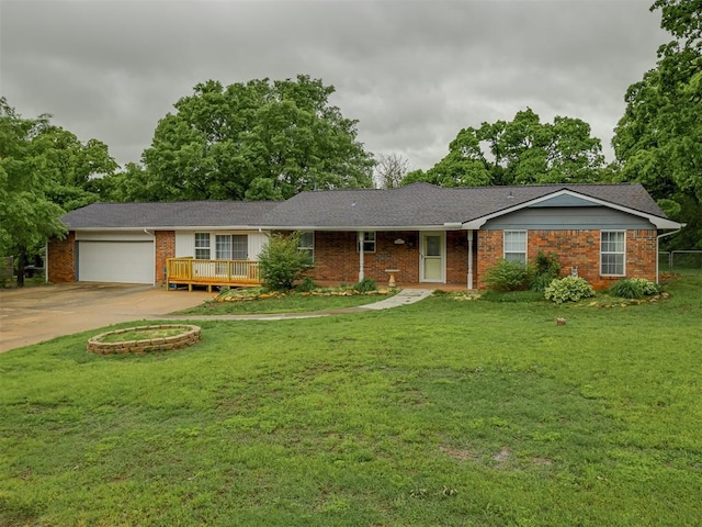 412 Brookside Dr, Guthrie, OK 73044 - single story home featuring brick siding, driveway, a front yard, and a garage