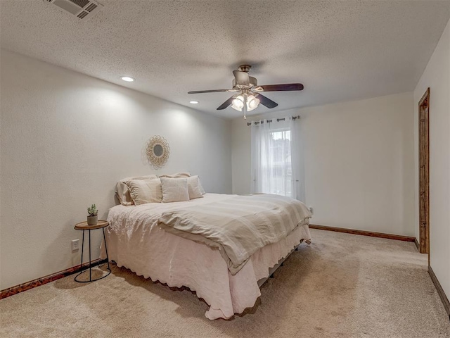 bedroom with recessed lighting, baseboards, light carpet, and a ceiling fan