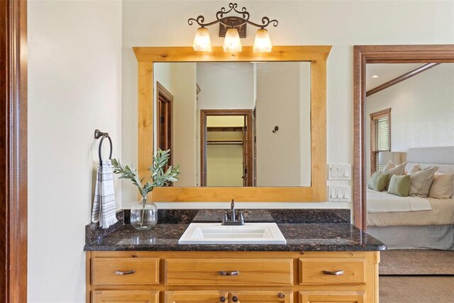 ensuite bathroom featuring vanity and ensuite bathroom