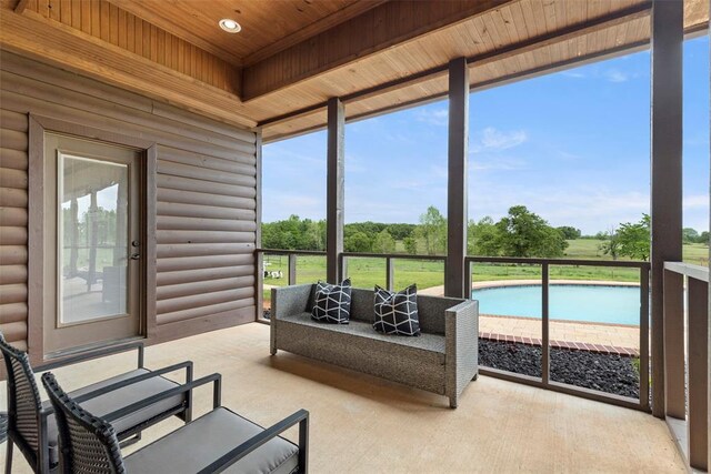 sunroom / solarium with a wealth of natural light