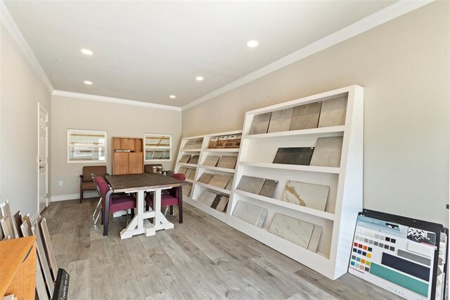 interior space with recessed lighting, ornamental molding, and wood finished floors