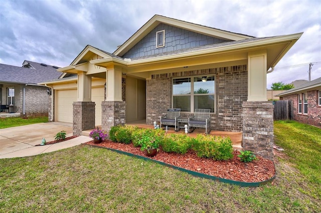 13313 Watson Dr, Piedmont, OK 73078 - craftsman house with a front yard, brick siding, concrete driveway, an attached garage, and a porch