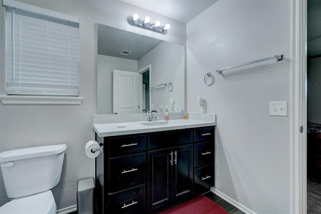 13313 Watson Dr, Piedmont, OK 73078 - bathroom featuring vanity, baseboards, toilet, and visible vents