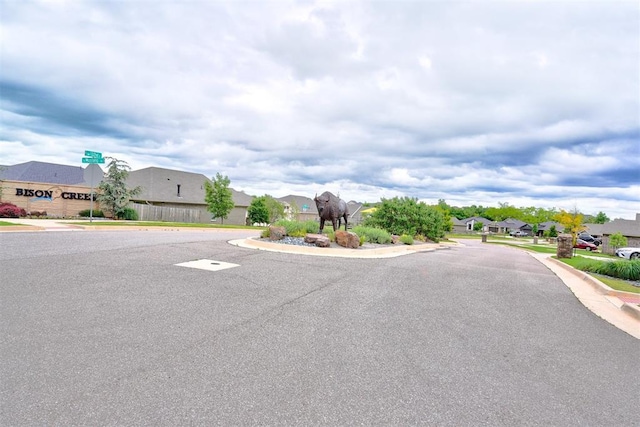 13313 Watson Dr, Piedmont, OK 73078 - view of road with a residential view, sidewalks, and curbs