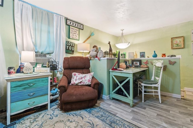 5720 12th Ave NW, Norman, OK 73069 - living area featuring wood finished floors and baseboards