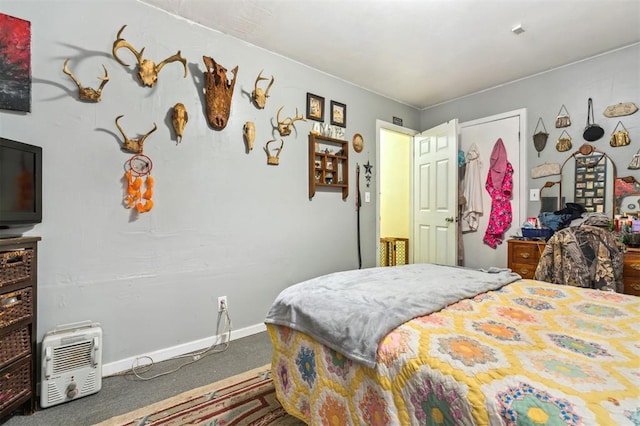 5720 12th Ave NW, Norman, OK 73069 - bedroom with carpet floors and baseboards
