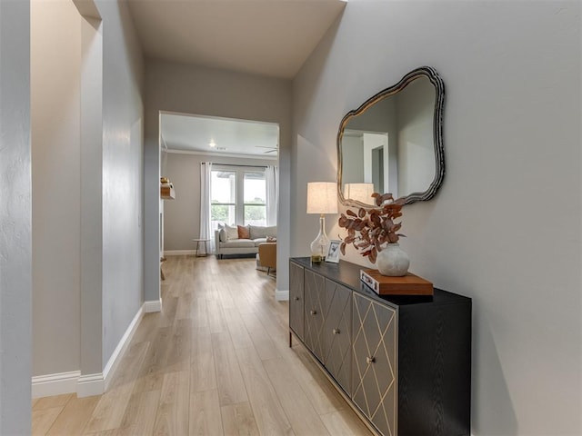 18444 Posse Trl, Norman, OK 73071 - hallway featuring baseboards and light wood-type flooring