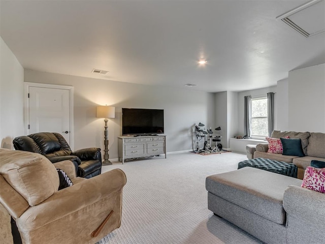 18444 Posse Trl, Norman, OK 73071 - living room with carpet floors, baseboards, and visible vents
