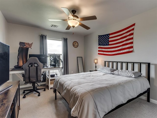 18444 Posse Trl, Norman, OK 73071 - bedroom featuring visible vents, carpet flooring, baseboards, and a ceiling fan