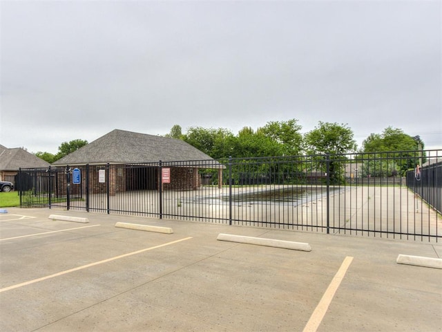 18444 Posse Trl, Norman, OK 73071 - uncovered parking lot with fence