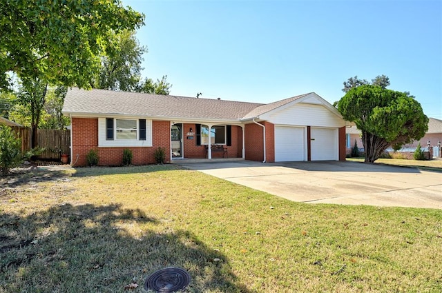 1508 Carlton Way, Oklahoma City, OK 73120 - ranch-style home featuring an attached garage, fence, brick siding, and concrete driveway