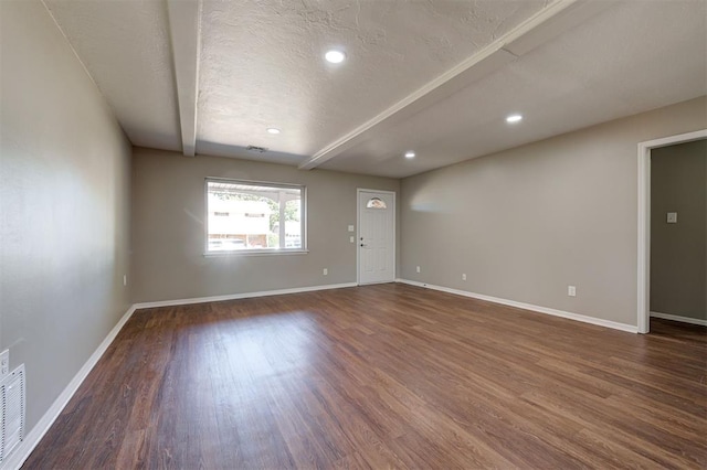 1508 Carlton Way, Oklahoma City, OK 73120 - spare room featuring visible vents, wood finished floors, baseboards, recessed lighting, and a textured ceiling