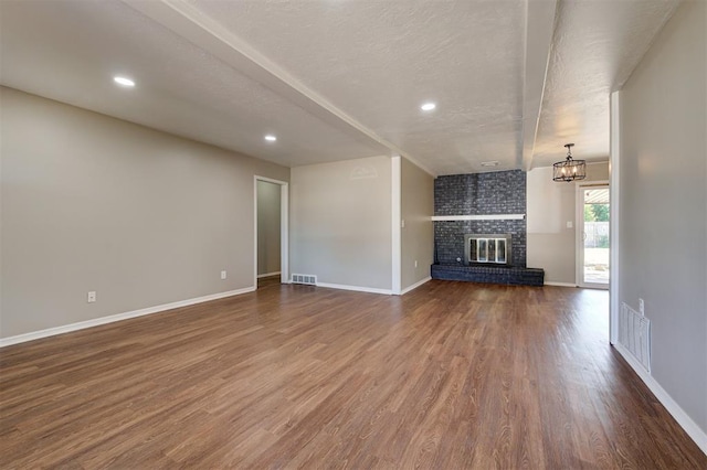 1508 Carlton Way, Oklahoma City, OK 73120 - unfurnished living room with baseboards, dark wood-type flooring, and visible vents
