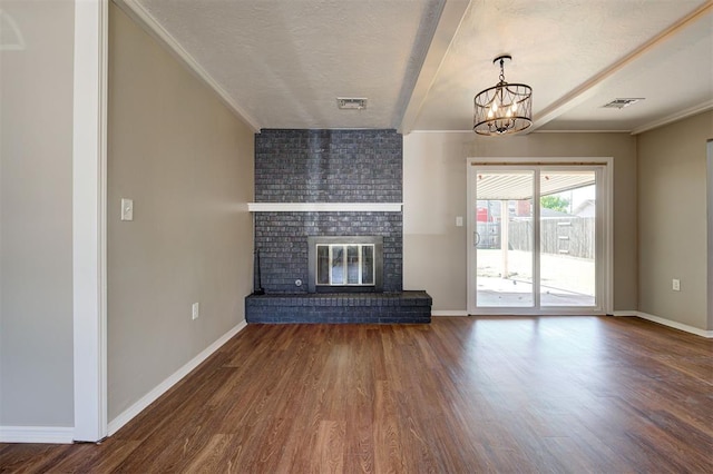 1508 Carlton Way, Oklahoma City, OK 73120 - unfurnished living room featuring visible vents, baseboards, wood finished floors, and a chandelier