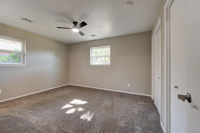 1508 Carlton Way, Oklahoma City, OK 73120 - unfurnished bedroom with visible vents, carpet flooring, and baseboards