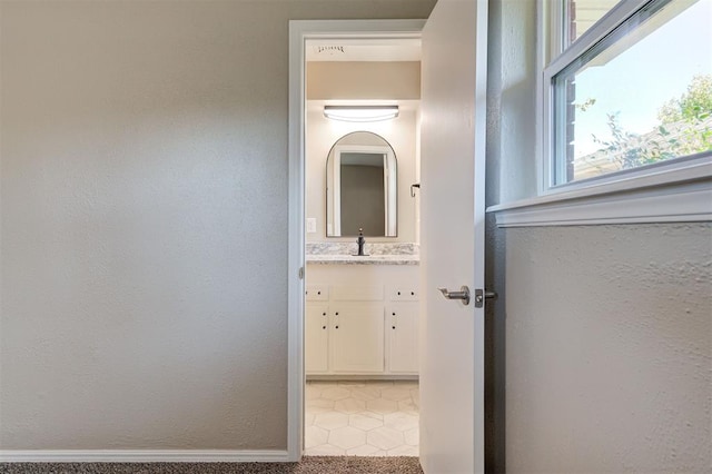 1508 Carlton Way, Oklahoma City, OK 73120 - interior space featuring vanity, baseboards, and tile patterned floors
