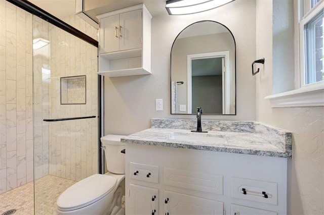 1508 Carlton Way, Oklahoma City, OK 73120 - bathroom with toilet, tiled shower, and vanity