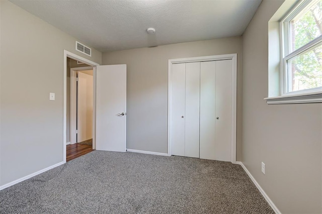 1508 Carlton Way, Oklahoma City, OK 73120 - unfurnished bedroom featuring carpet floors, baseboards, a closet, and visible vents