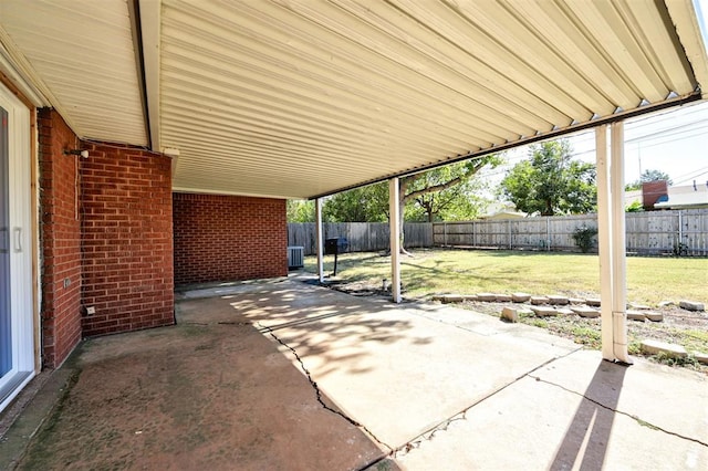 1508 Carlton Way, Oklahoma City, OK 73120 - view of patio / terrace featuring a fenced backyard and an attached carport