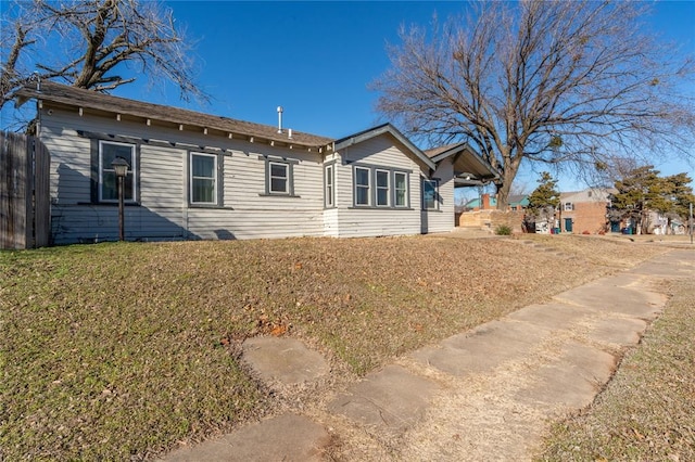 exterior space featuring a lawn