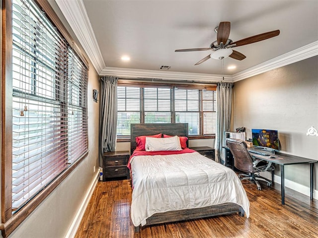 319 NE 1st St, Oklahoma City, OK 73104 - bedroom with baseboards, visible vents, ornamental molding, and wood finished floors