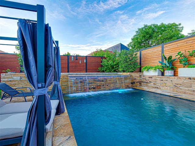 319 NE 1st St, Oklahoma City, OK 73104 - view of swimming pool with a fenced in pool and a fenced backyard