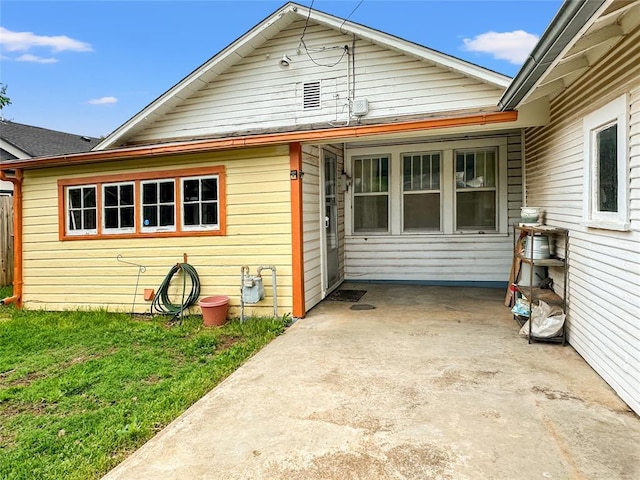 903 Sunset Dr, El Reno, OK 73036 - back of property with a patio