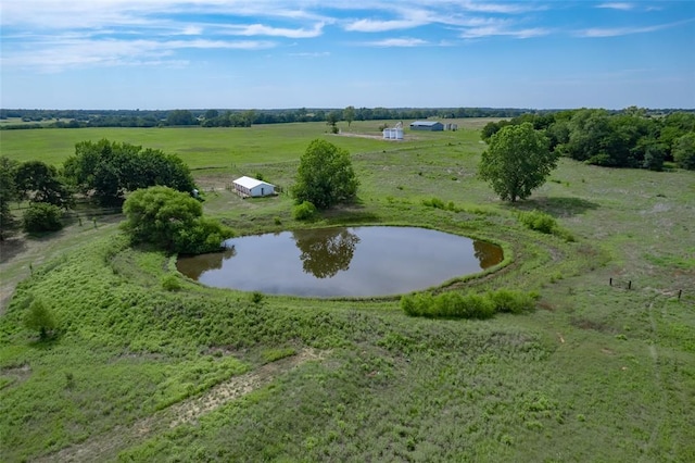 bird's eye view featuring a water view and a rural view