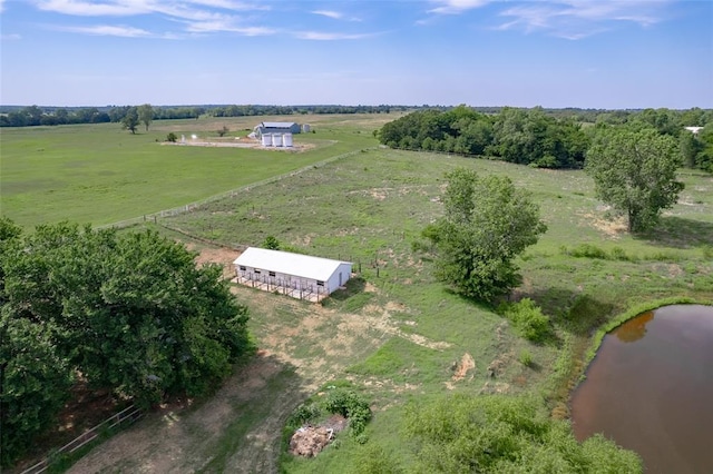 bird's eye view with a water view and a rural view