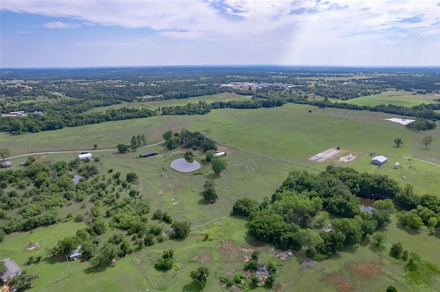 birds eye view of property featuring a rural view
