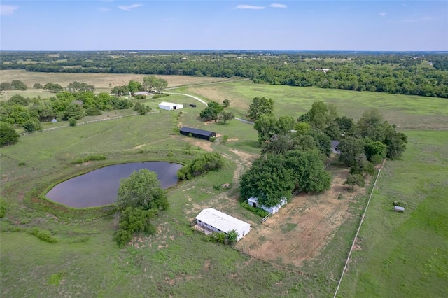 drone / aerial view with a water view and a rural view