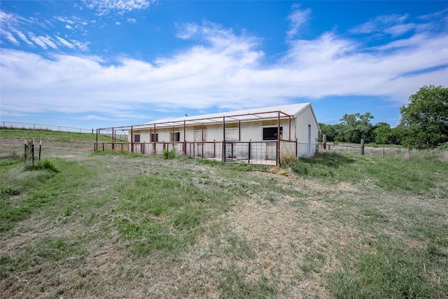 view of outbuilding featuring an exterior structure and an outbuilding