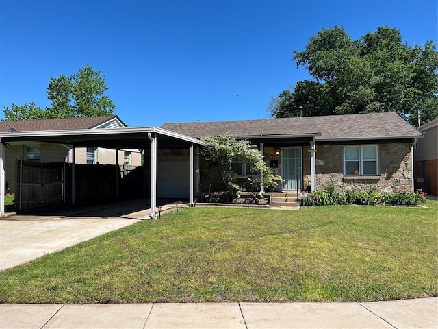 3233 SW 40th St, Oklahoma City, OK 73119 - single story home featuring a front yard, a garage, concrete driveway, stone siding, and an attached carport