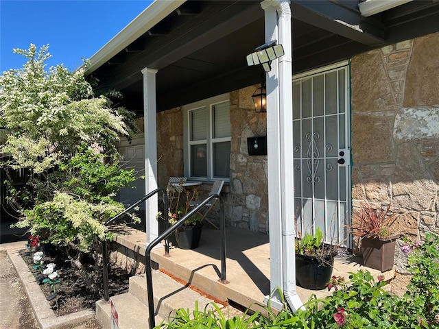 3233 SW 40th St, Oklahoma City, OK 73119 - exterior space featuring a porch and stone siding