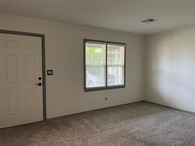 3233 SW 40th St, Oklahoma City, OK 73119 - carpeted spare room featuring visible vents and baseboards