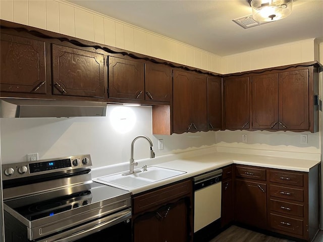 3233 SW 40th St, Oklahoma City, OK 73119 - kitchen featuring white dishwasher, dark brown cabinets, a sink, under cabinet range hood, and stainless steel electric stove