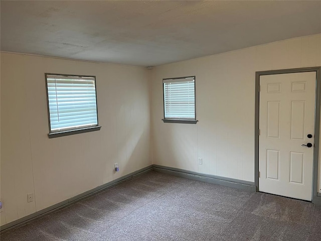 3233 SW 40th St, Oklahoma City, OK 73119 - carpeted spare room featuring baseboards