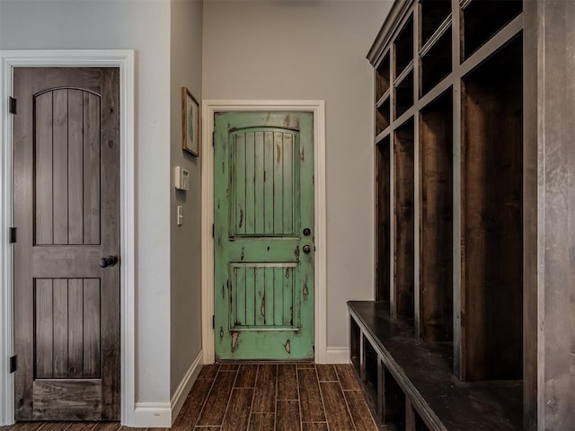 7437 SW 105th St, Oklahoma City, OK 73173 - mudroom featuring baseboards and dark wood-style floors