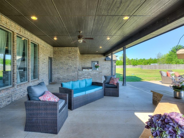 7437 SW 105th St, Oklahoma City, OK 73173 - view of patio / terrace with outdoor lounge area, a ceiling fan, and a fenced backyard