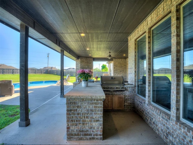 7437 SW 105th St, Oklahoma City, OK 73173 - view of patio / terrace with ceiling fan, exterior kitchen, fence, and a grill