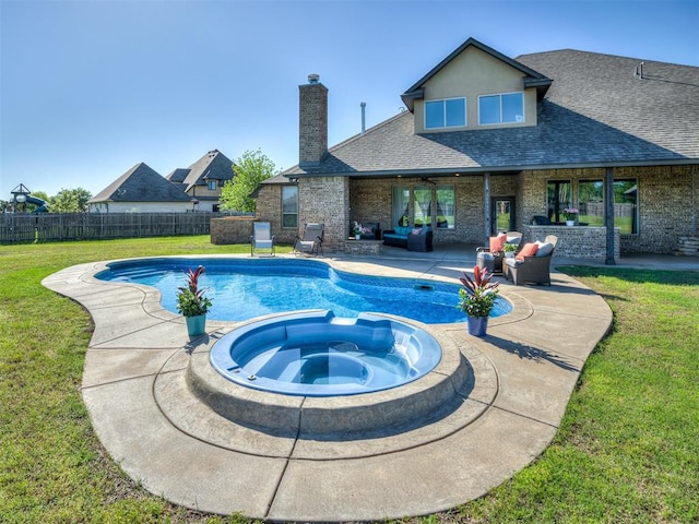 7437 SW 105th St, Oklahoma City, OK 73173 - view of swimming pool with fence, a pool with connected hot tub, an outdoor hangout area, a patio, and a yard