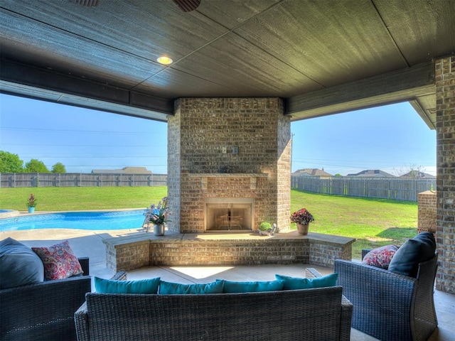 7437 SW 105th St, Oklahoma City, OK 73173 - view of patio with a fenced backyard, a fenced in pool, and an outdoor living space with a fireplace