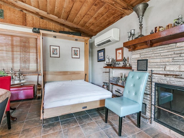 bedroom with vaulted ceiling with beams, a stone fireplace, a wall unit AC, and wood ceiling