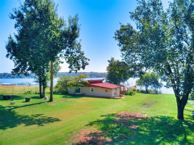 view of yard with a water view