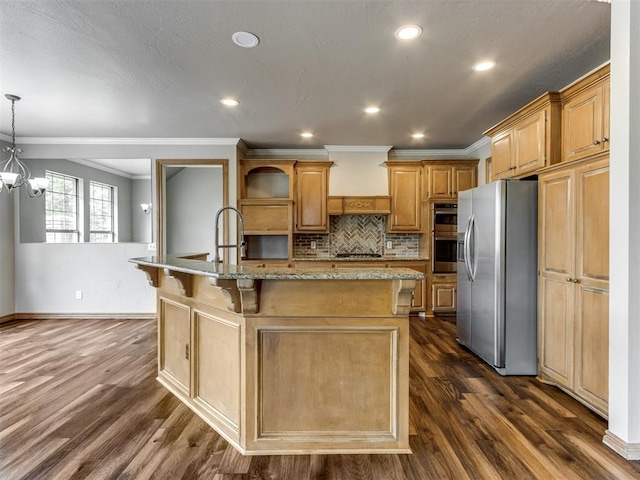 kitchen with crown molding, appliances with stainless steel finishes, a kitchen bar, and dark wood-type flooring
