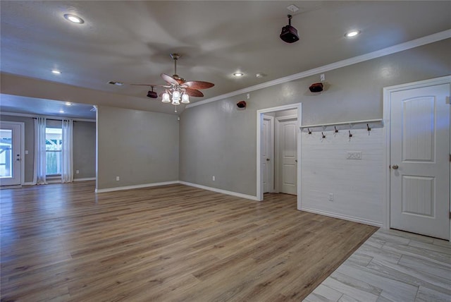 spare room with recessed lighting, a ceiling fan, light wood-style flooring, and ornamental molding