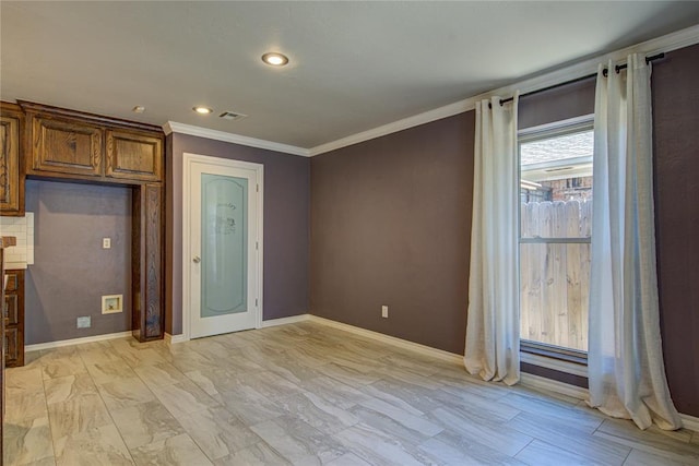 interior space featuring crown molding, baseboards, recessed lighting, and visible vents