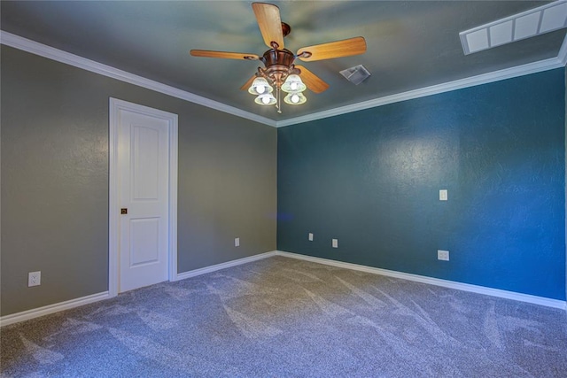 carpeted empty room with visible vents, baseboards, and ceiling fan