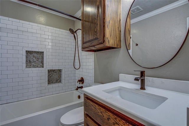bathroom with crown molding, shower / washtub combination, vanity, toilet, and a textured wall